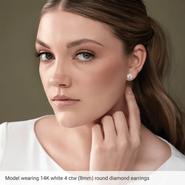 model wearing earring 4ctw model wearing 14k white gold earrings 4 ctw