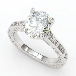 Oval Vintage inspired engagement ring. intricate engravings. White gold