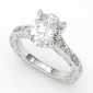 Oval Vintage inspired engagement ring. intricate engravings. White gold