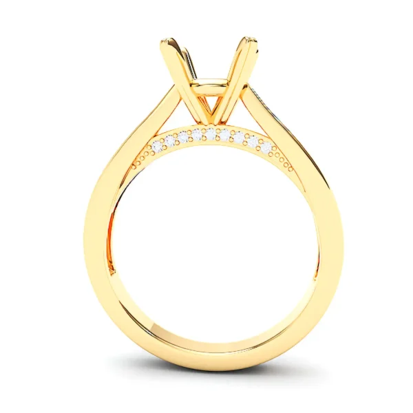 Yellow gold engagement ring setting with a four-prong mount for a central gemstone. Beneath the mount, a curved bridge features a row of small round diamonds. The polished band has a sleek, modern profile.